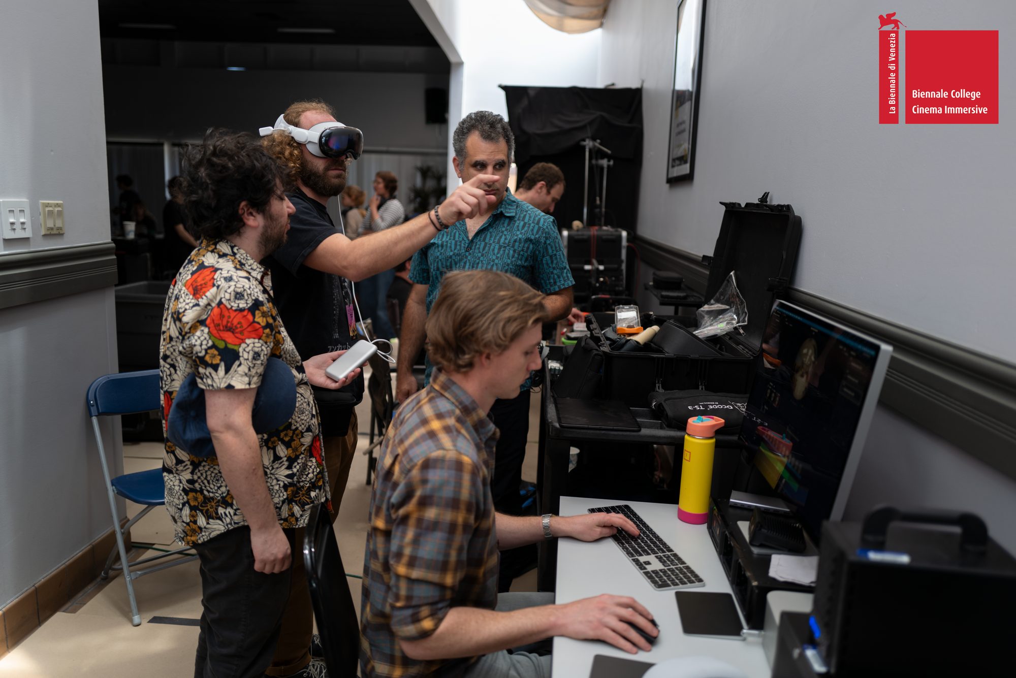 The team reviewing footage in Apple Vision Pro next to a colour-grading station