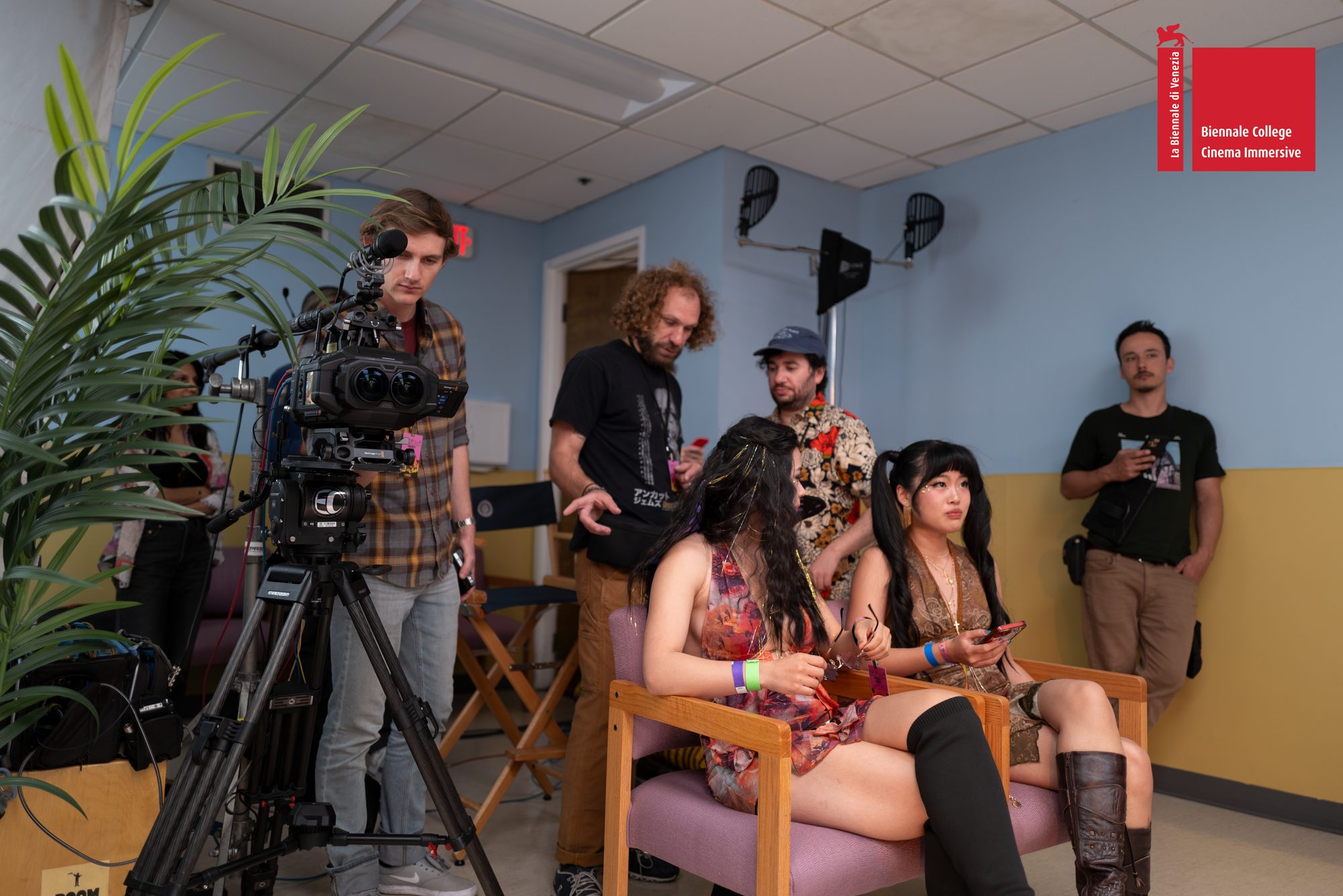 Actors and crew waiting between takes next to the immersive camera rig